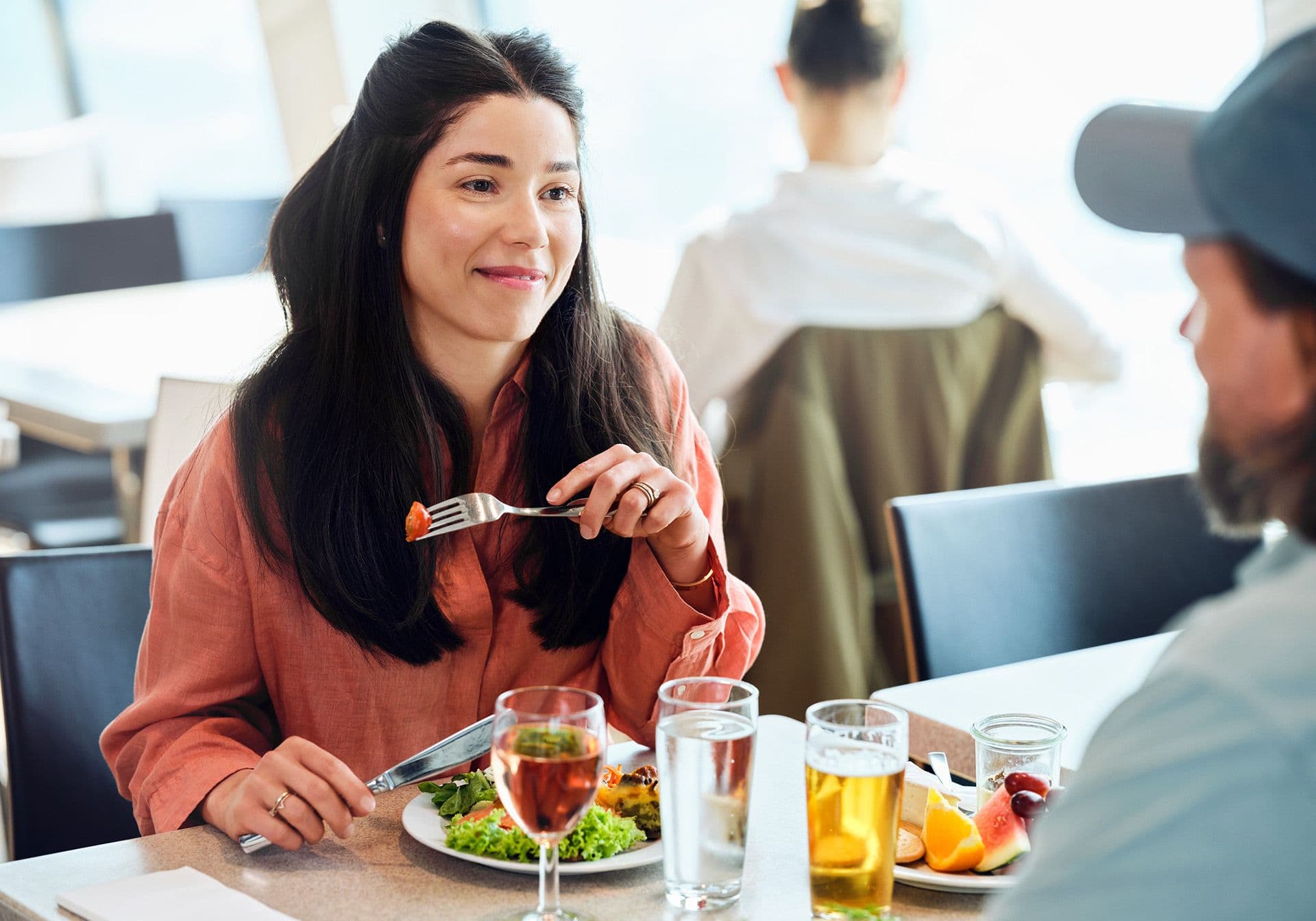 Woman and man eating a meal on a Scandlines ferry